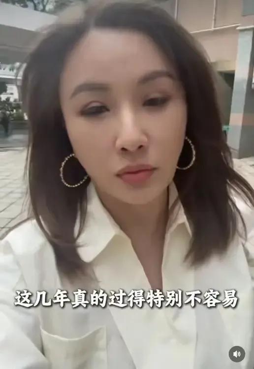 张文慈否认有市值7000万房产，去年年底买的房子还是弟弟担保后，才办理的按揭购房