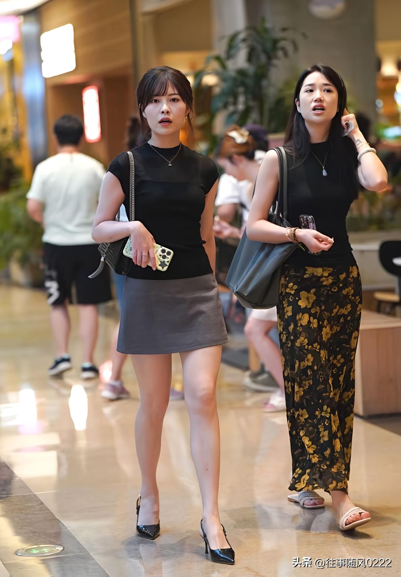 繁华街市里   佳人步履轻