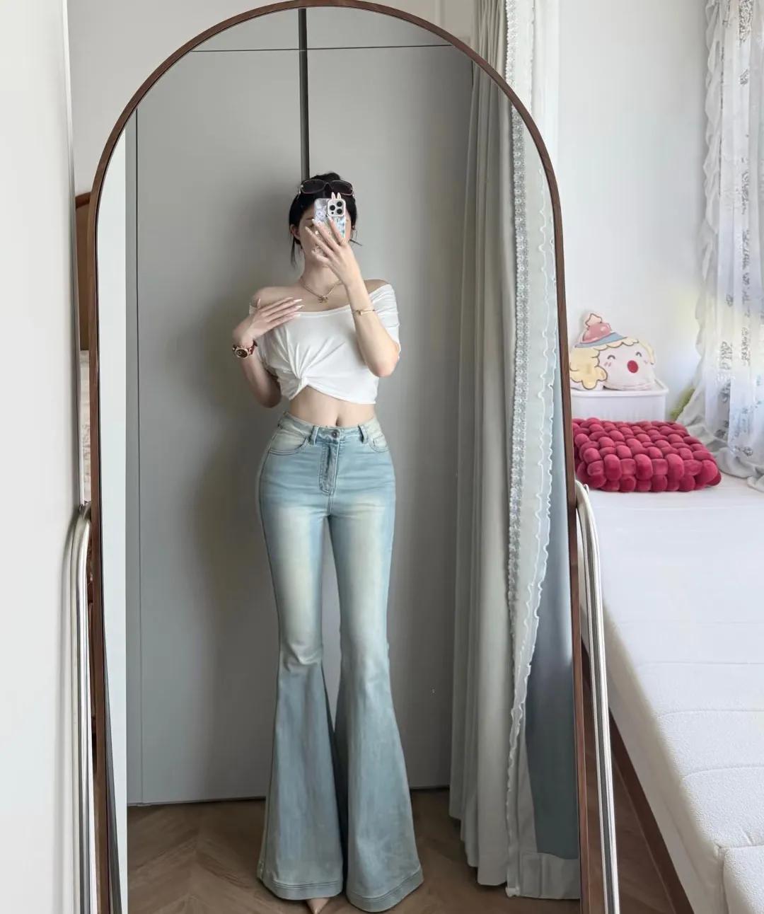 什么样的牛仔裤，显着身材性感高挑那还得是紧身微喇牛仔裤性感风牛仔裤 完美身材牛仔