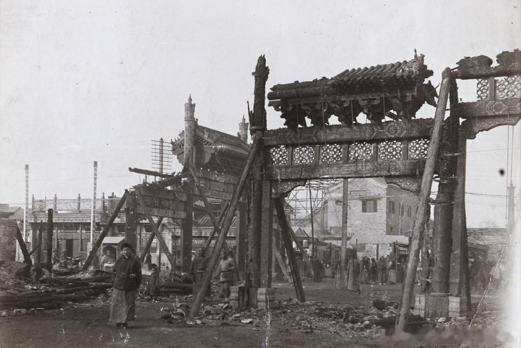 Fire damaged pailou after mutiny, Peking