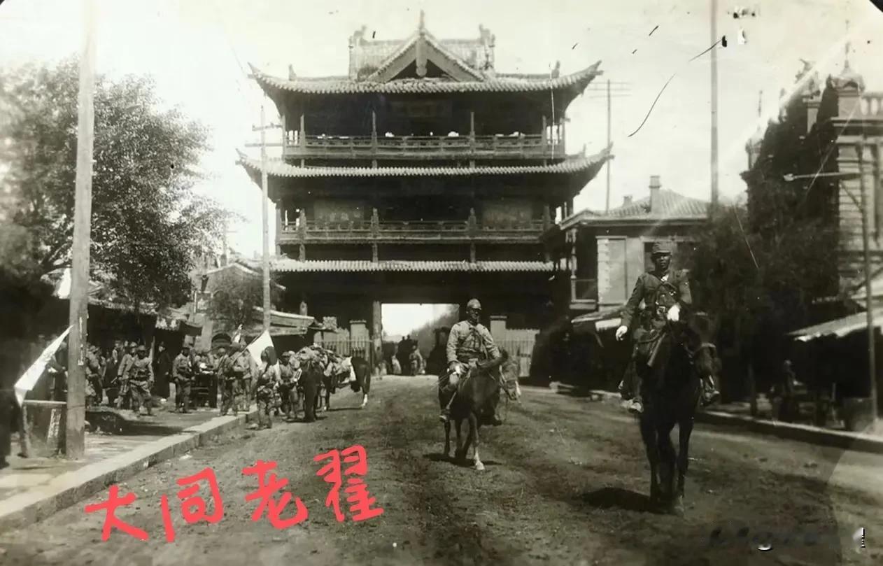 痛心的1937年9月13日，鬼子闯进了我的家园，鼓楼下的鬼子耀武扬威地横冲直闯。