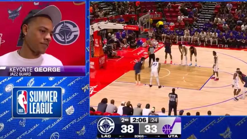NBA夏季联赛激战正酣，爵士今天对阵快船。基昂特·乔治来到现场观战，他在场边接受