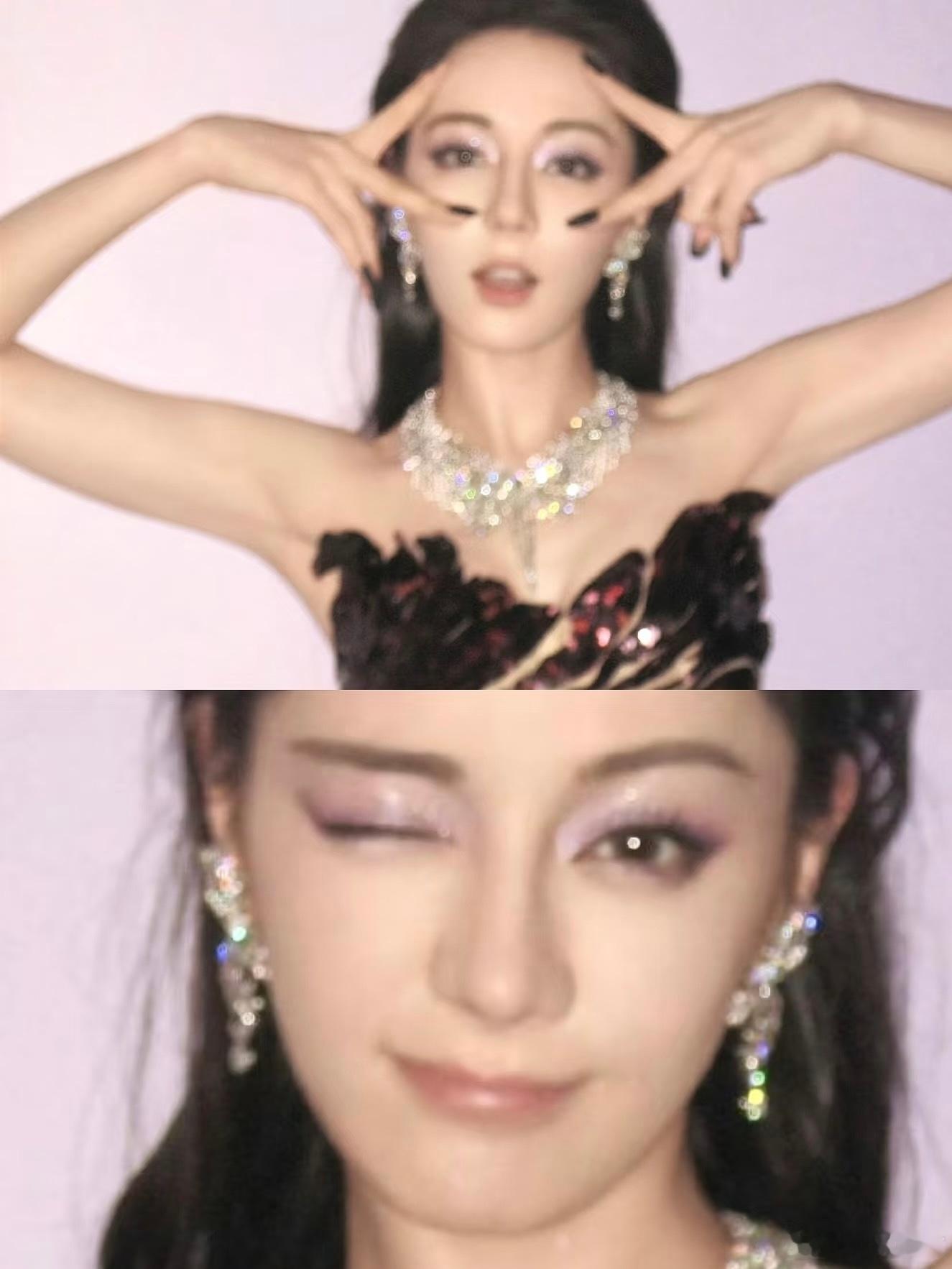 迪丽热巴的紫色眼妆[笑而不语] 