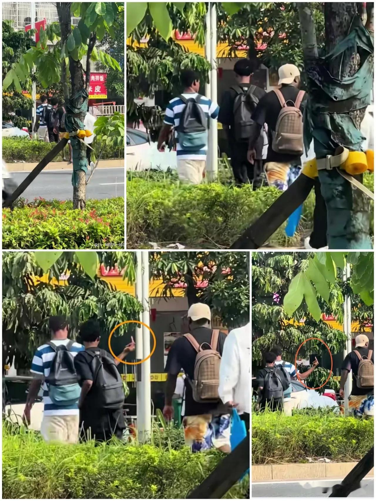 网传几名北大留学生（不知哪个学校，留学生是真的）横穿马路，踩踏绿化带，还对路人竖