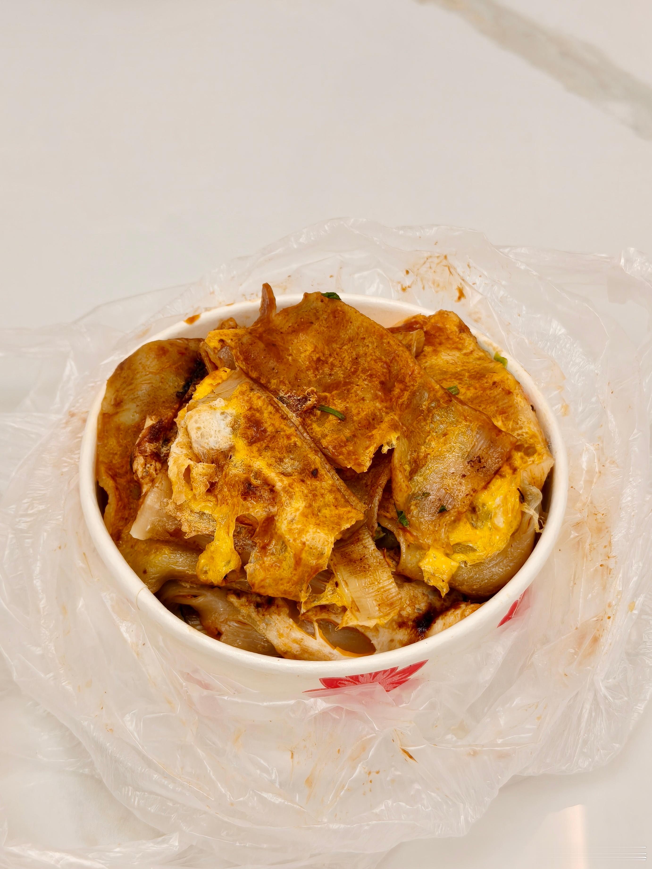 作为土生土长的黑龙江鸡西人，我观察下来家乡食物走的最远、推广最成功的就是烤冷面了