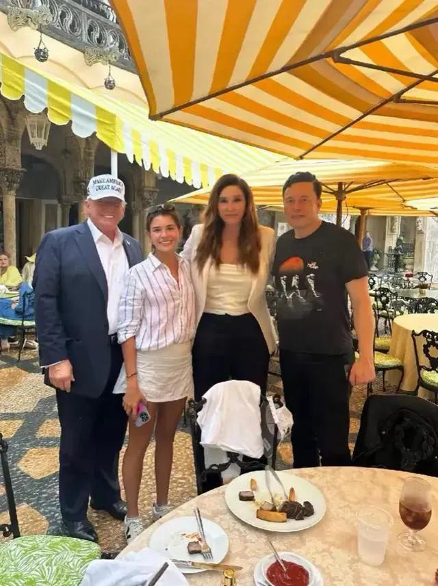 世界首富马斯克和美国总统和两位美女一起吃饭，桌上的盘子摆着牛排，还有红酒，这一顿