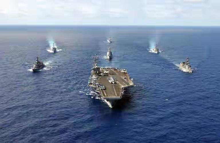 美军最近在中东的动作有点大。航母关了应答器玩起“隐身”，战机一批批往那儿飞，眼看