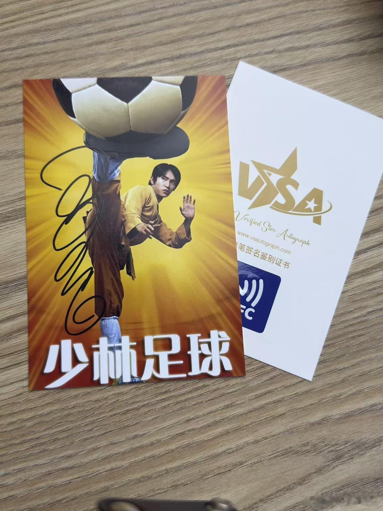 周星驰签名照片 