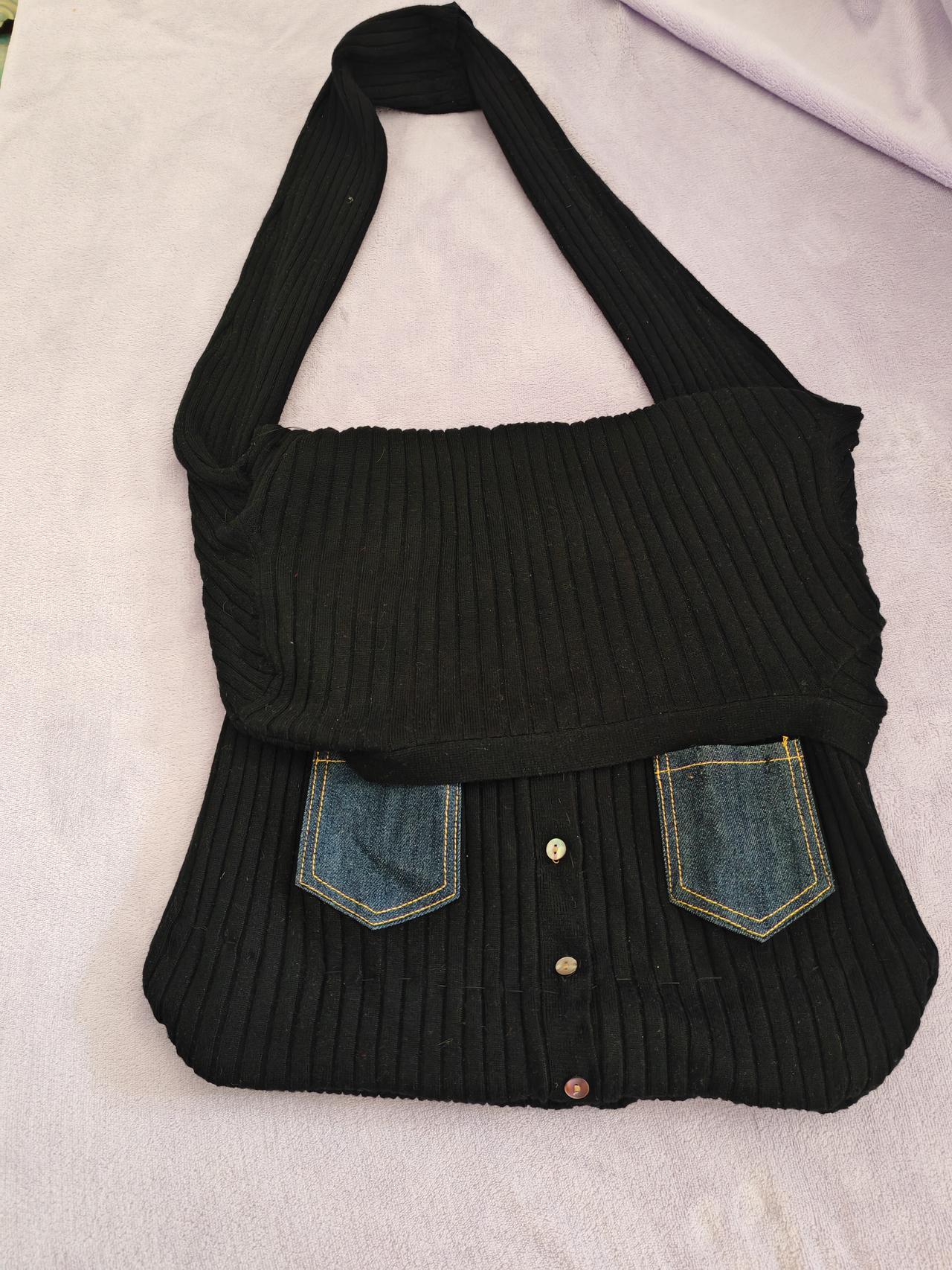 这包有个毛病，装了东西后会往下坠很长很长，大家有没有解决的办法呢？欢迎评论区留言