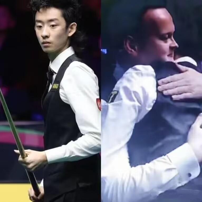 吴宜泽18：17夺冠以后
做了一个令人意外的动作。
他没有立刻欢呼庆祝，他径直走
