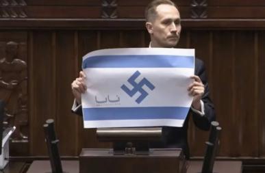 波兰议员当众篡改以色列国旗！
4月14号，波兰议会下议院的常规会议上，出了件惊动