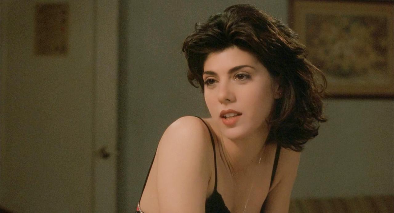 这是玛丽莎·托梅最美的时期
她修长而匀称的身材
以及充满感染力的灿烂笑容
定义了