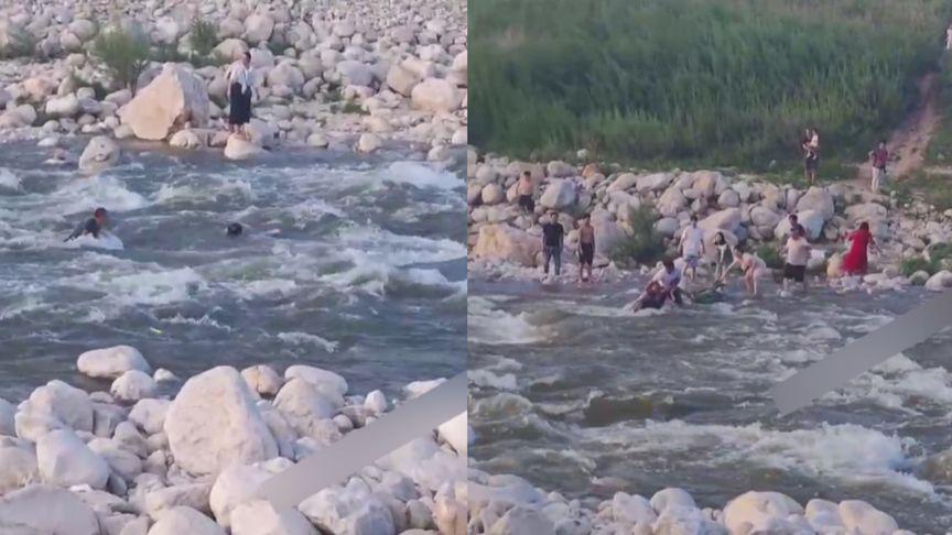 【男子骑车从上游赶来，提醒玩水市民“涨水了”，2人被冲走后获救】7月31日陕西西