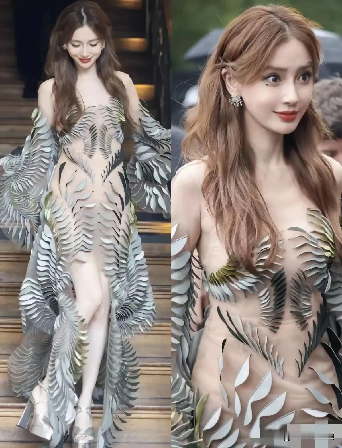巴黎时装周上的杨颖，一身树叶装登场，美的闪闪发光。
一个36岁的女人，身材保持的
