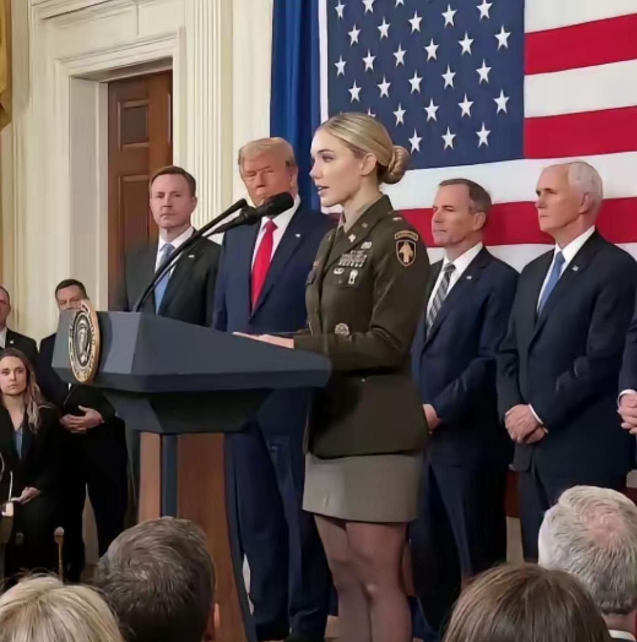 男人都喜欢漂亮的女人，就算美国总统也不例外。
        一位美国女军官登台