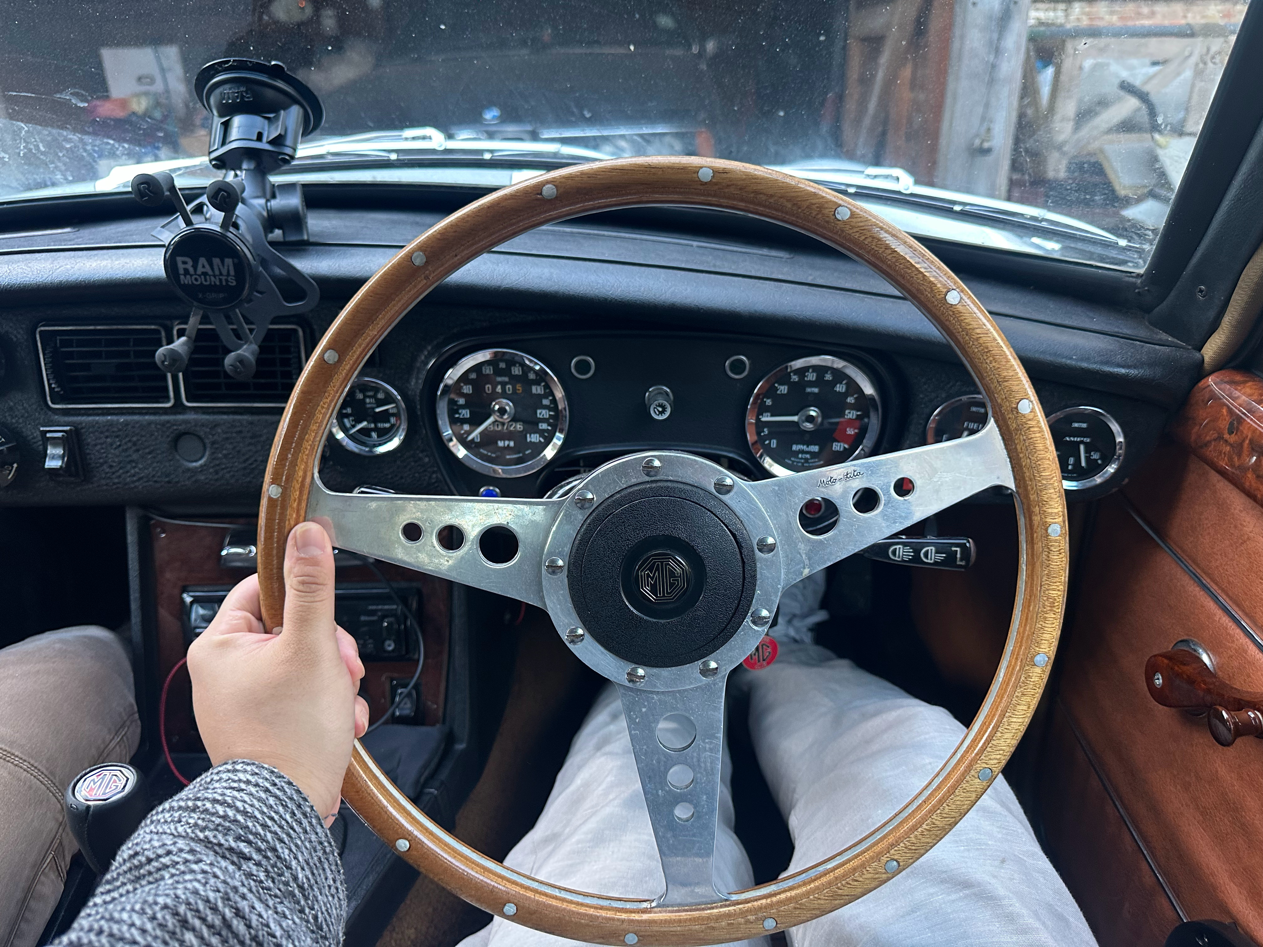 Three men, a dog & some cars.  ​​​