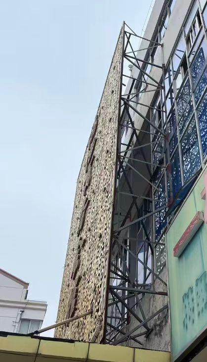 案例讨论：算外立面改造还是加装店招？
网页链接