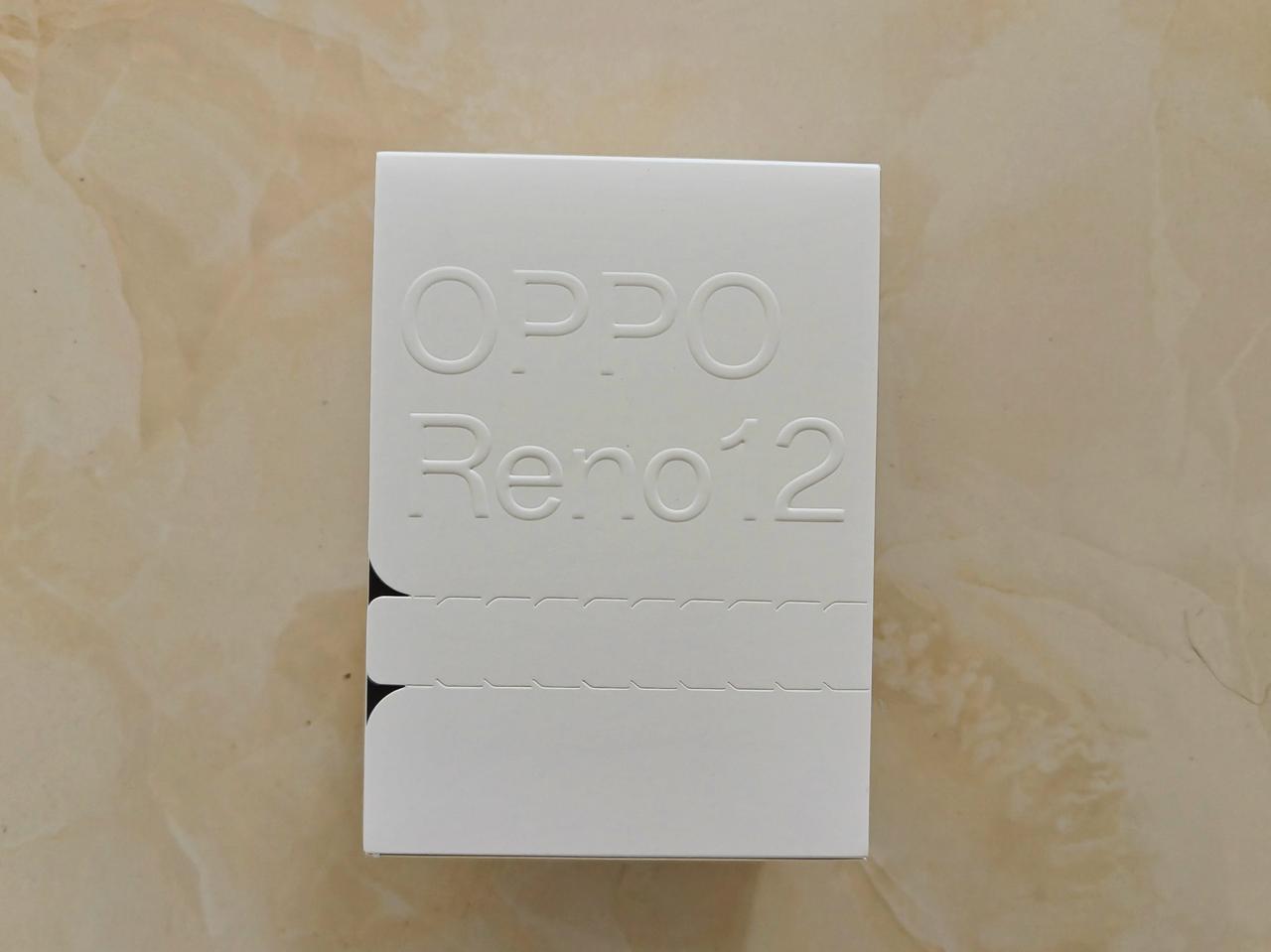 收到OPPO Reno12系列新品发布会邀请函，是一个盲盒，我拆看一看是两个K，