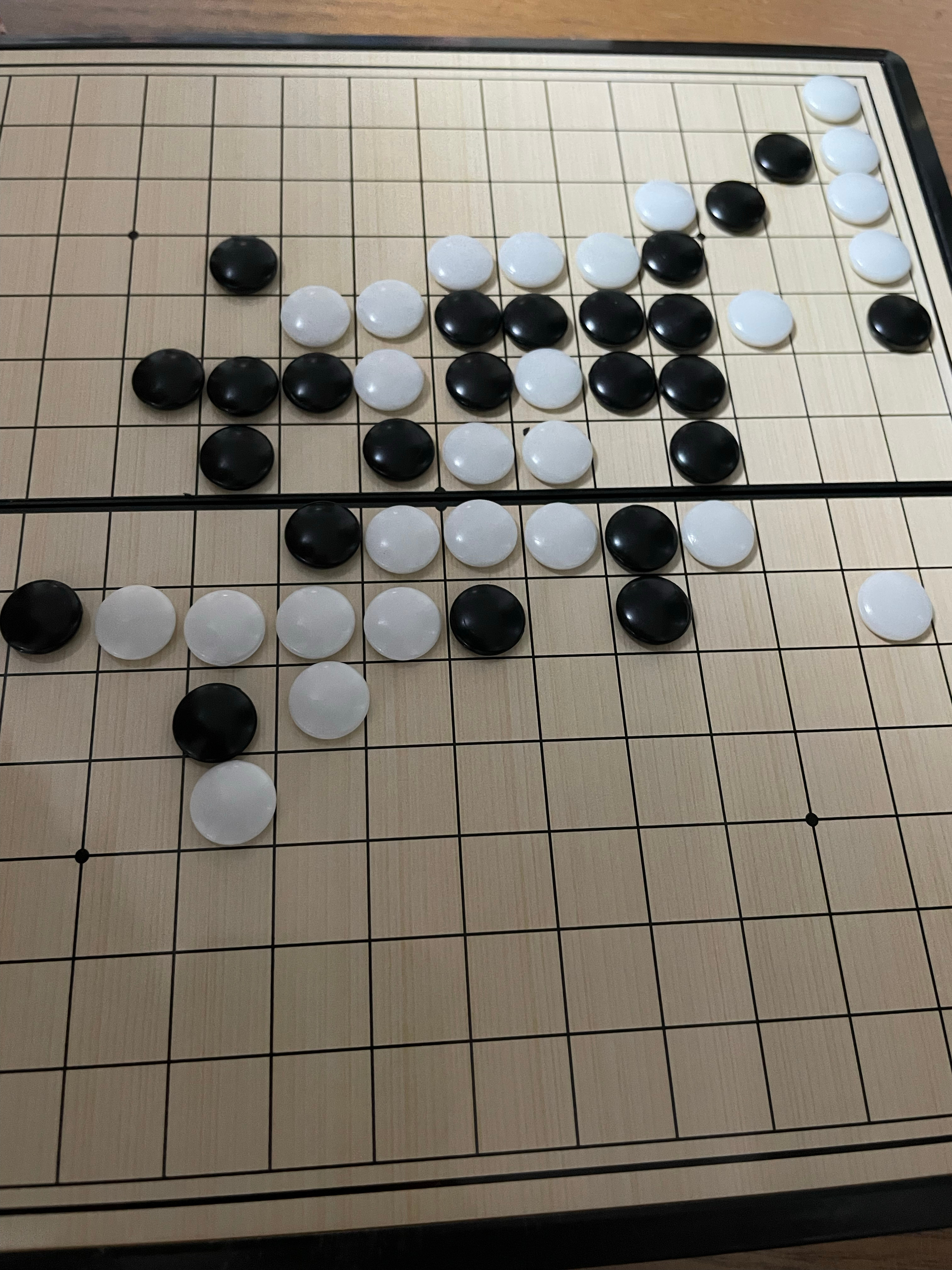 生活手记 陪我闺女下五子棋，小朋友下的真不错！ 