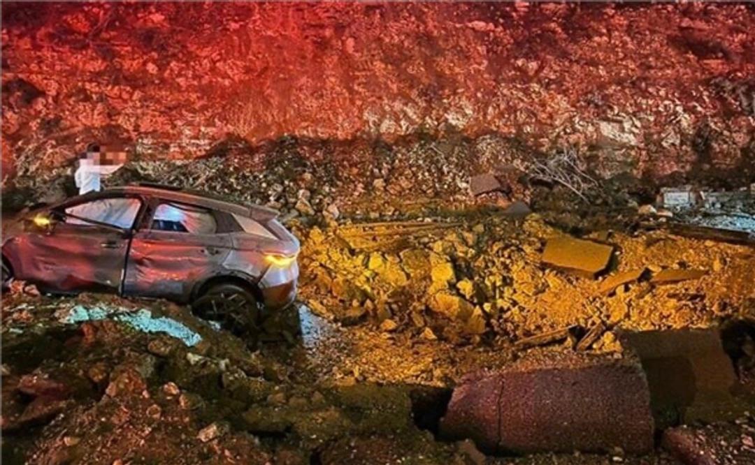 这辆比亚迪，在以色列硬生生扛了一发导弹。

车门还能打开，双闪还在跳，三个人，活