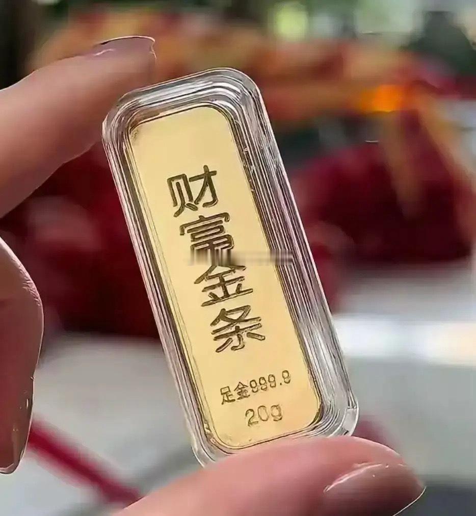 杭州骆女士在2011年在西湖银泰中国黄金柜台花12000元买两根20克金条，近期