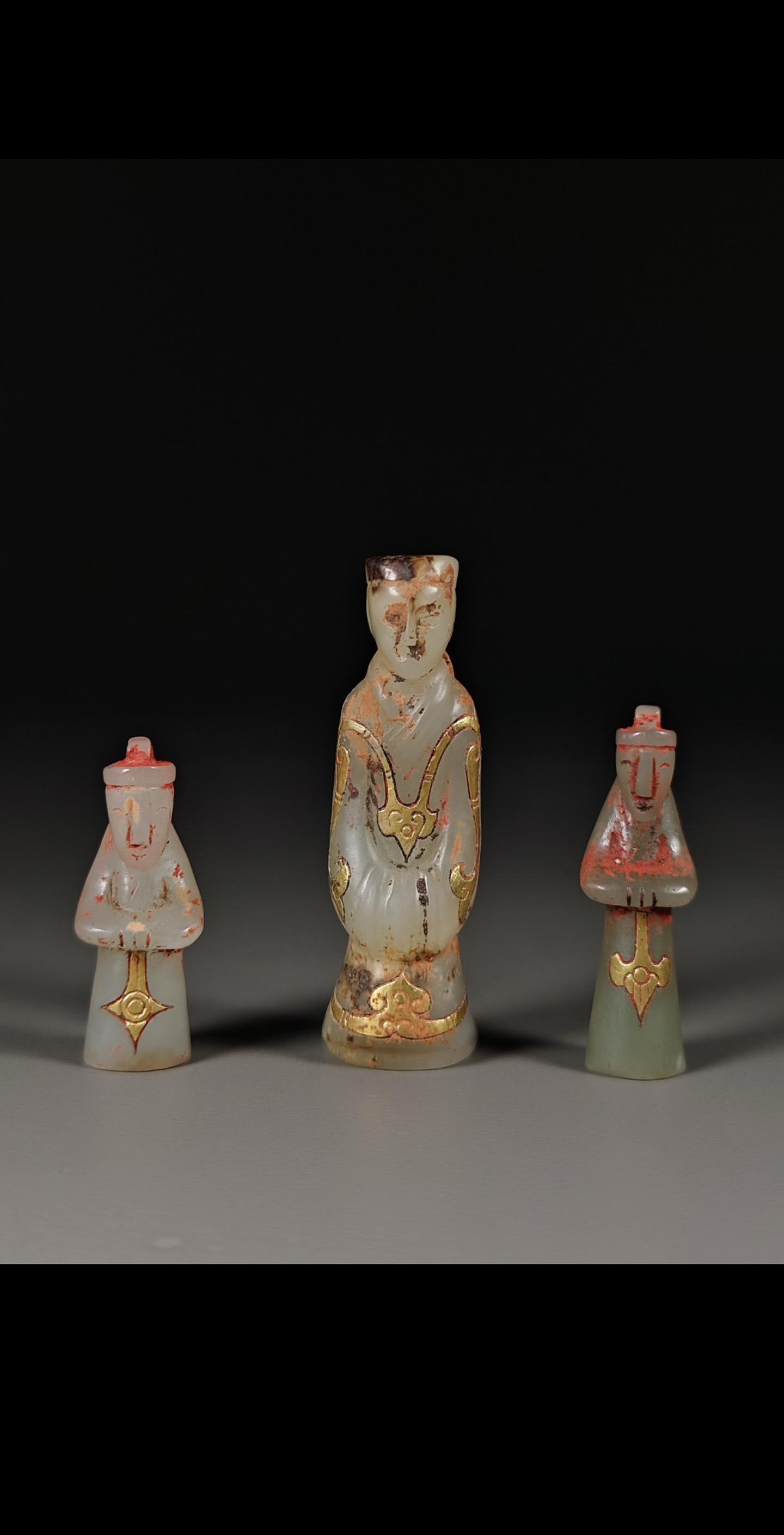 错金玉人。这是一组汉代错金玉人，它以和田玉为材质，采用了汉代极具代表性...