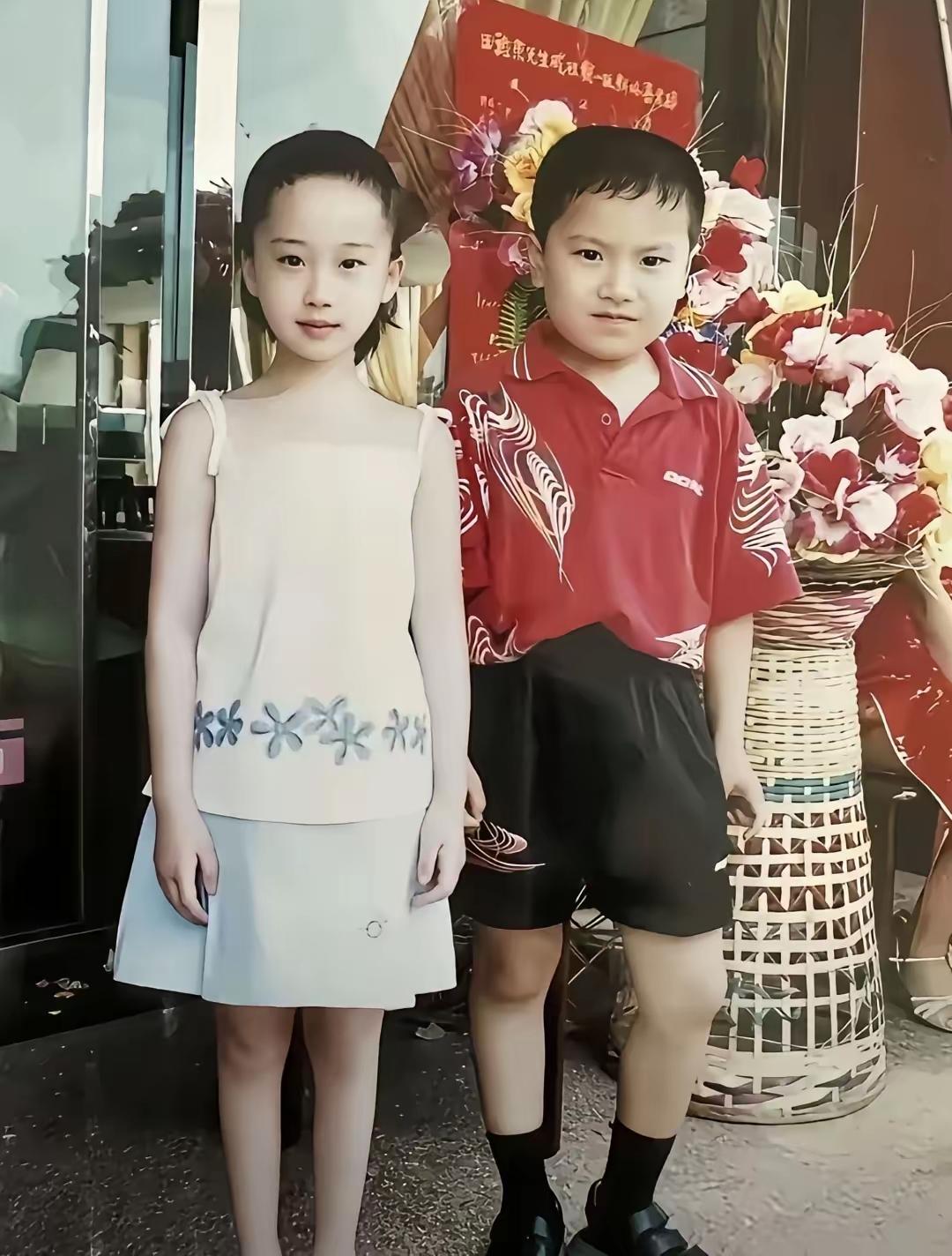 谁是乒坛名将，看起来有点象在役的大胖，是粱靖崑吧
女的又是谁，请知道的说说