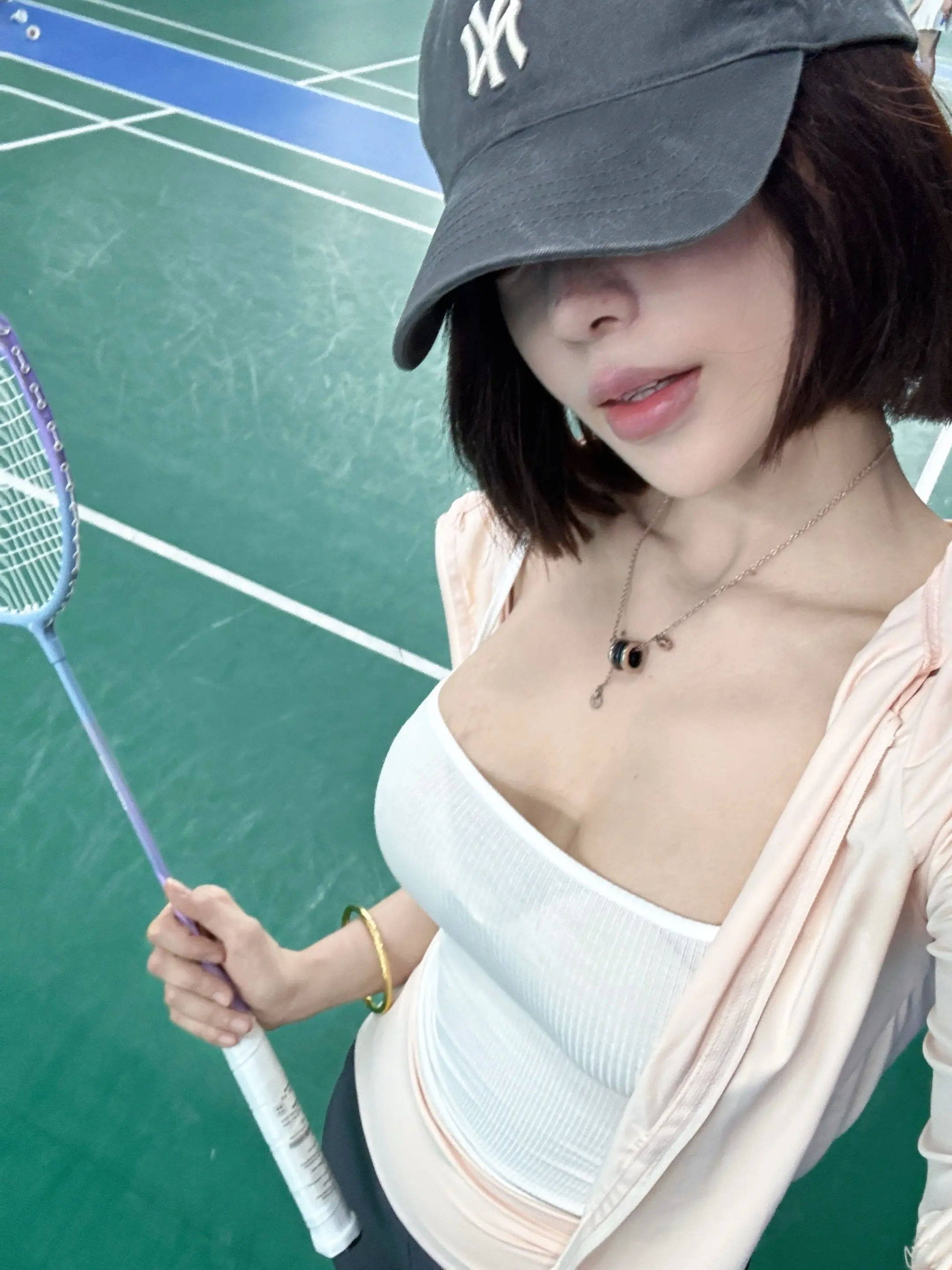 🏸