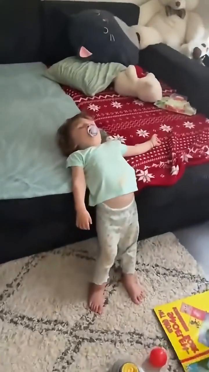 Here he is again sleeping with his arms 