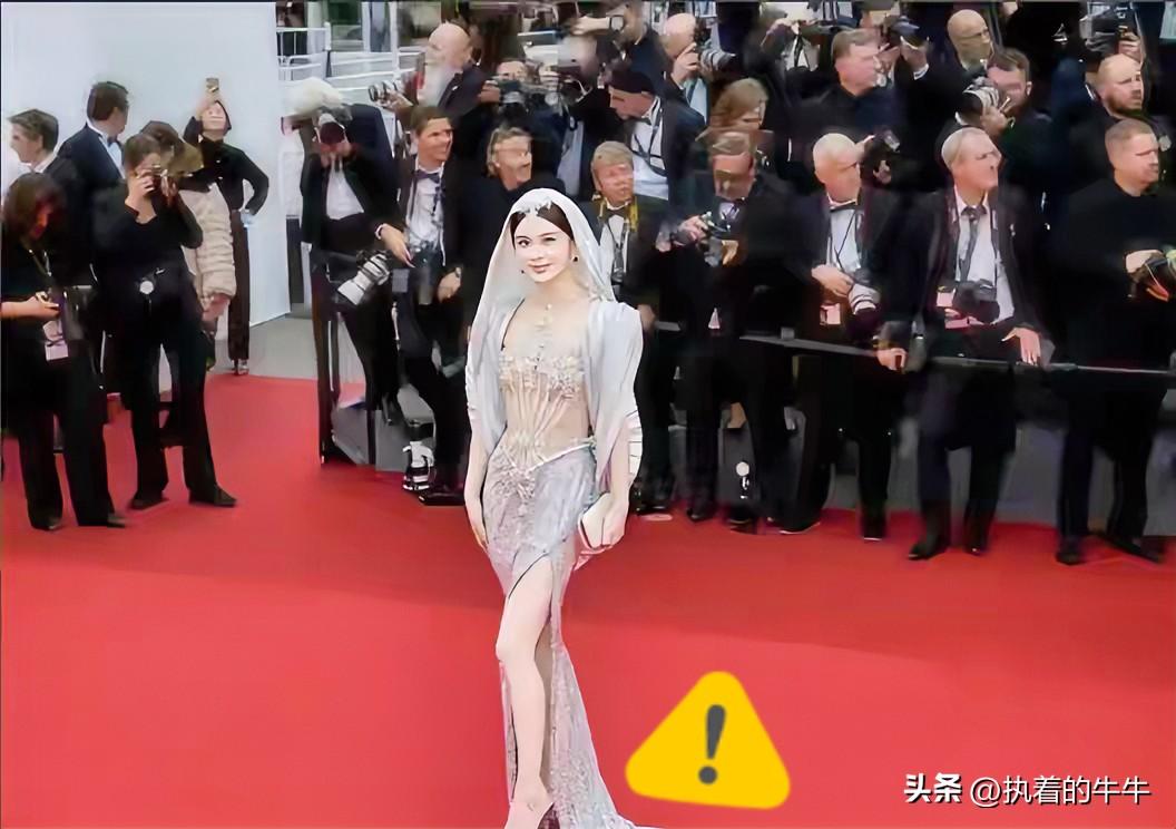 这姐姐心理素质真强！
整整5分钟，硬是杵在戛纳红毯的台阶上，赶都赶不走！

身上