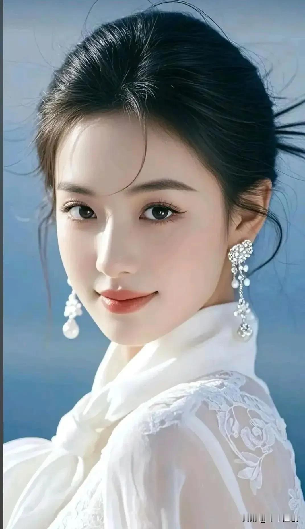 白纱绣满柔的花，珠珥垂成光的线。发梢掠开风的软，连笑都甜成了云的形状。
温婉高级