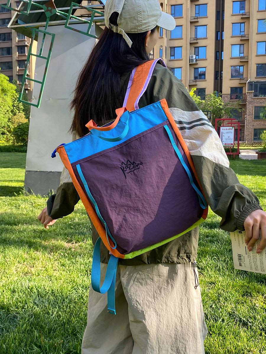 开学季重磅主推这款撞色全能大容量双肩包，大胆明亮拼接配色一眼抓视线，手提+双肩两