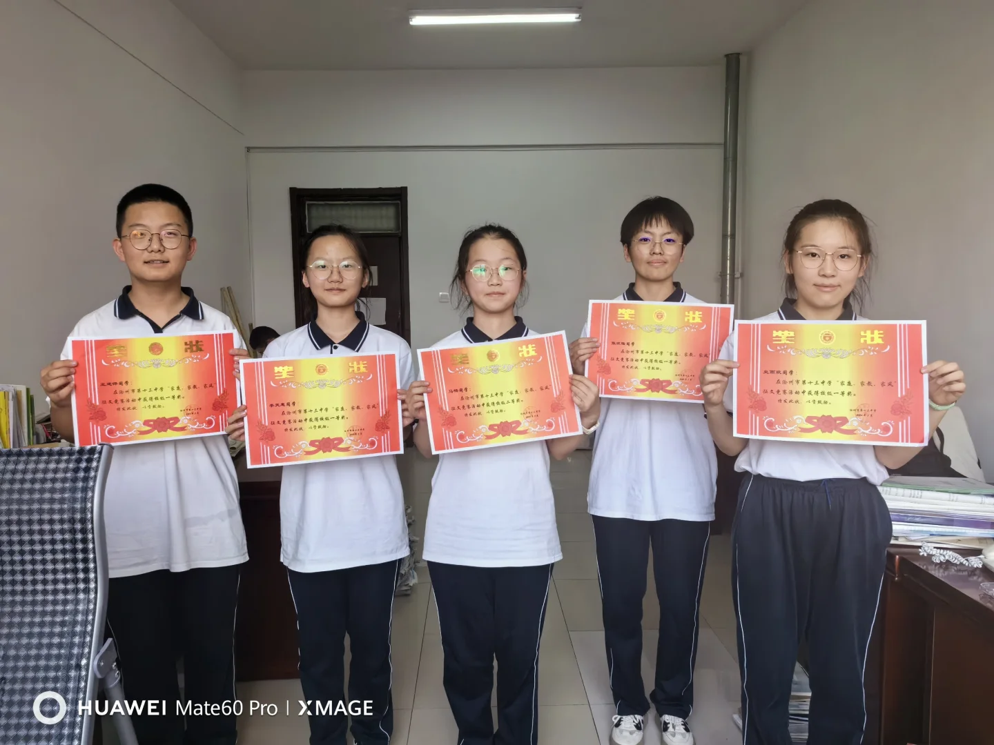 征文比赛，全校21篇，我班占5篇且均获奖！