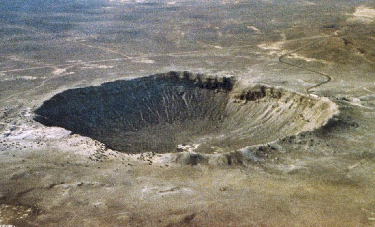 【地球早期生命可能在陨石坑中繁衍】

一颗小行星砸向地球，通常意味着火光、冲击波