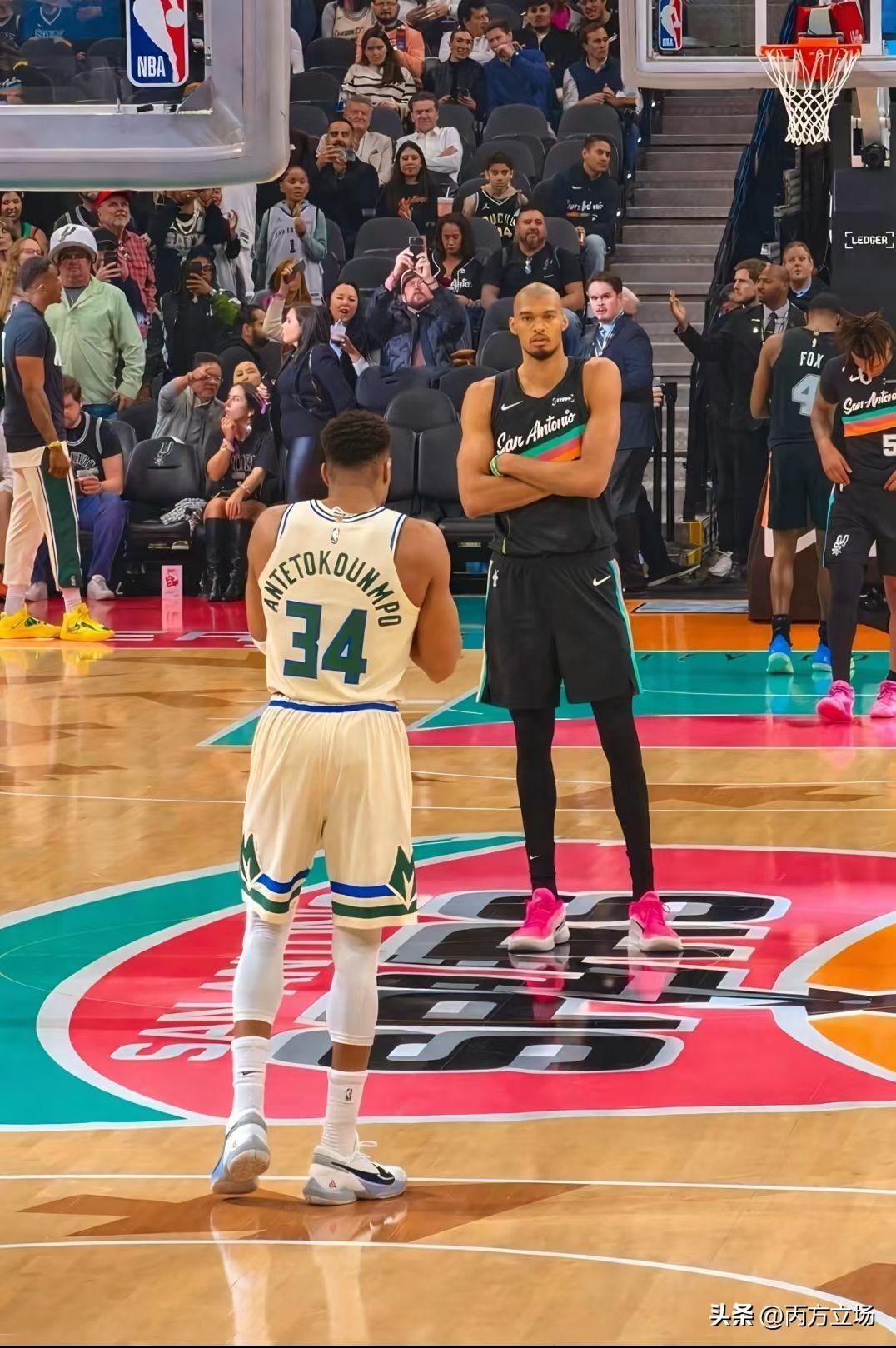 字母哥够猛了吧？一身腱子肉冲起来像坦克。可直到碰上文班亚马，才懂啥叫“一山更比一