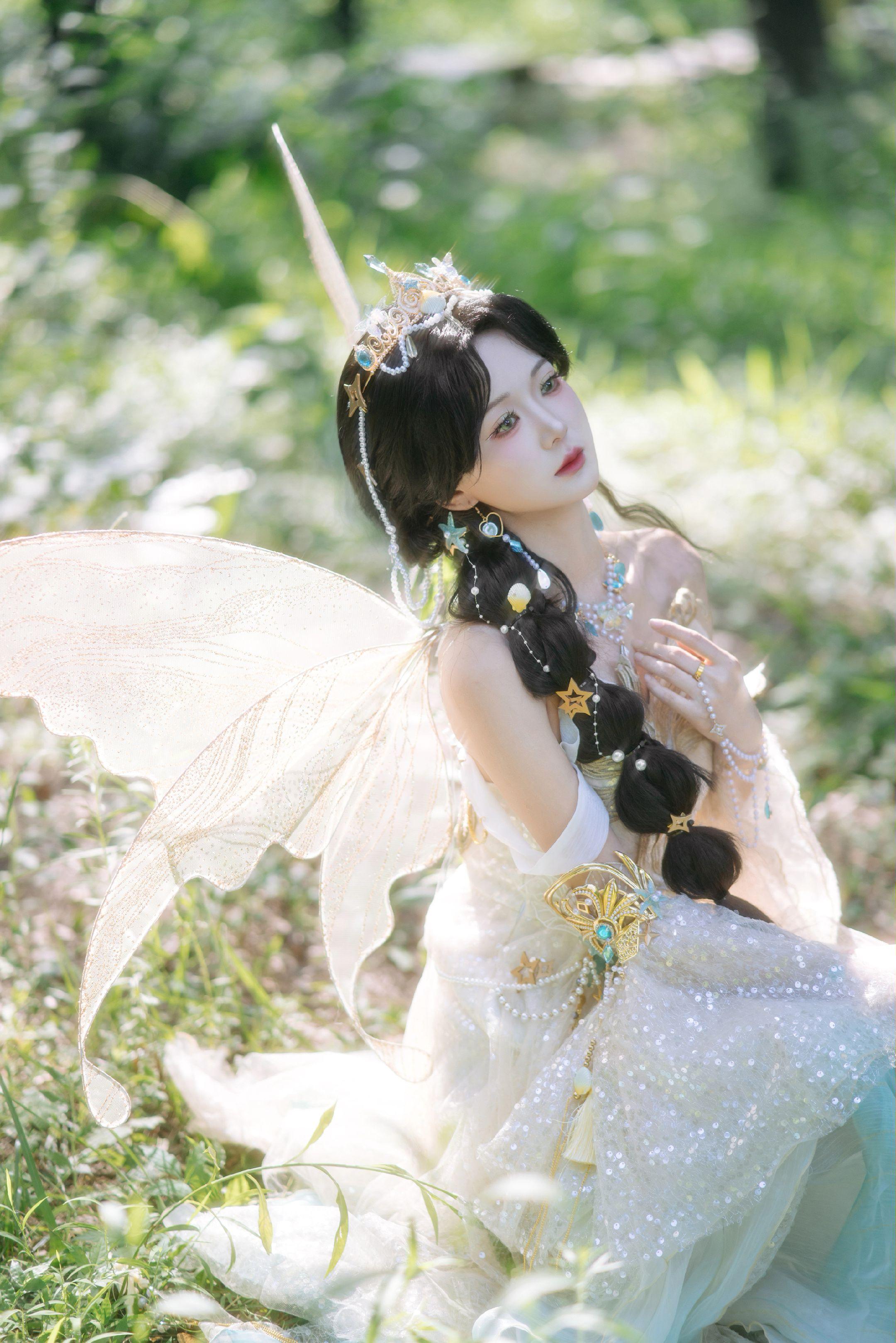 “落入人间的精灵～”。