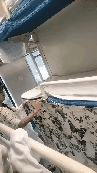 女子乘坐火车卧铺，用布把下铺围帘起来，是保护隐私吗？

网上见这个视频，挺有意思