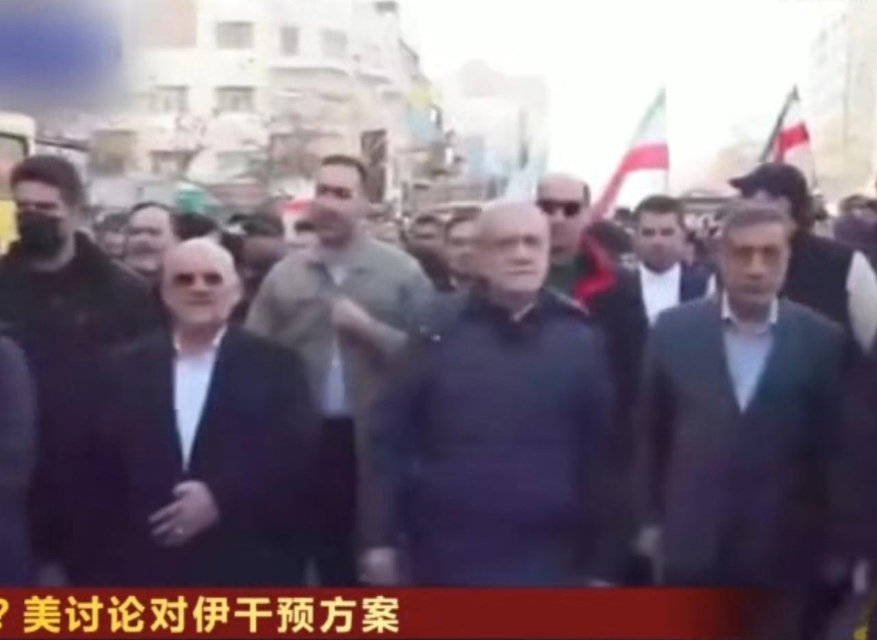 画面聚焦美伊局势博弈，伊朗国内民众挥舞国旗、参与集会展现出强烈的民族凝聚力，伊朗