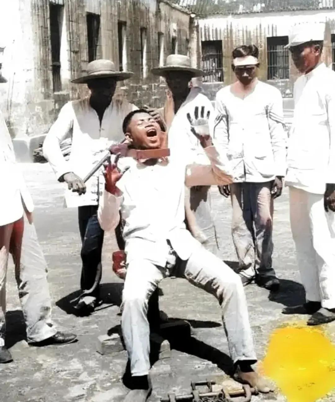 1928年，菲律宾监狱，执行“扼杀”刑罚的现场，一名年轻的男子，坐在死刑椅子上，