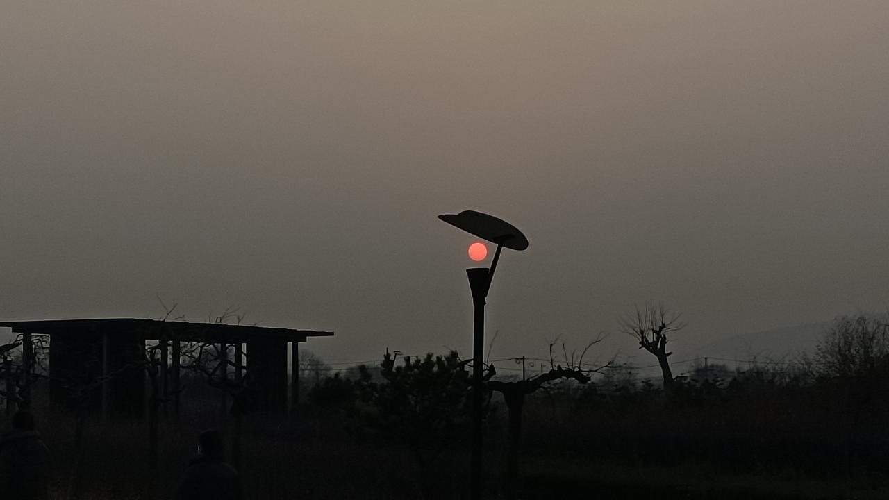 发一张图片，让我猜出你在哪里拍的夕阳西虹。