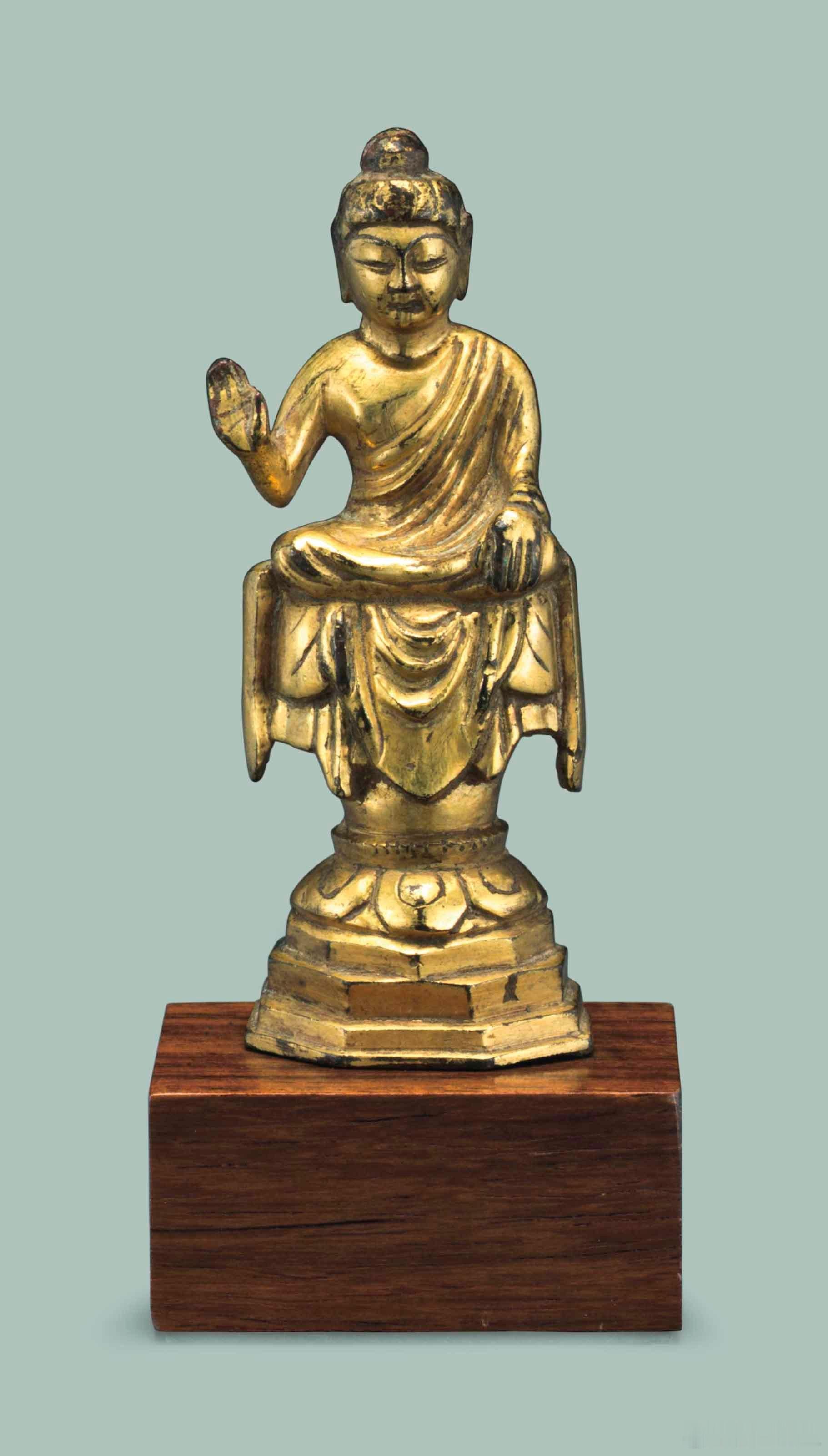 唐 銅鎏金佛坐像2013.9纽约佳士得 32500USD成交来源：Mayuyam