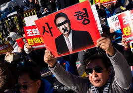 韩国社会对尹锡悦被判终身监禁反应强烈 一、尹锡悦因“叛乱罪”被判终身监禁引发全国