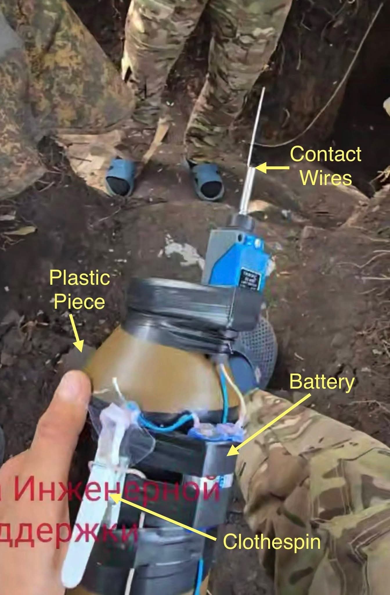 TBG-7温压弹改造为FPV神风无人机战斗部的方式。保险是个晾衣夹子，中间的绝缘