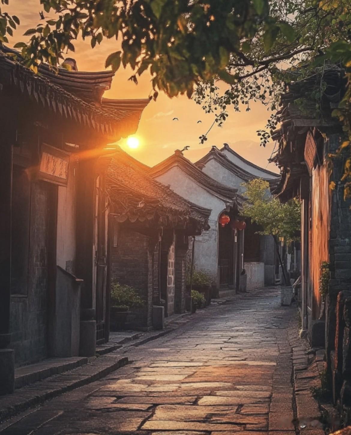 上联：江南小巷笼烟雨
   下联：古镇长街映夕阳