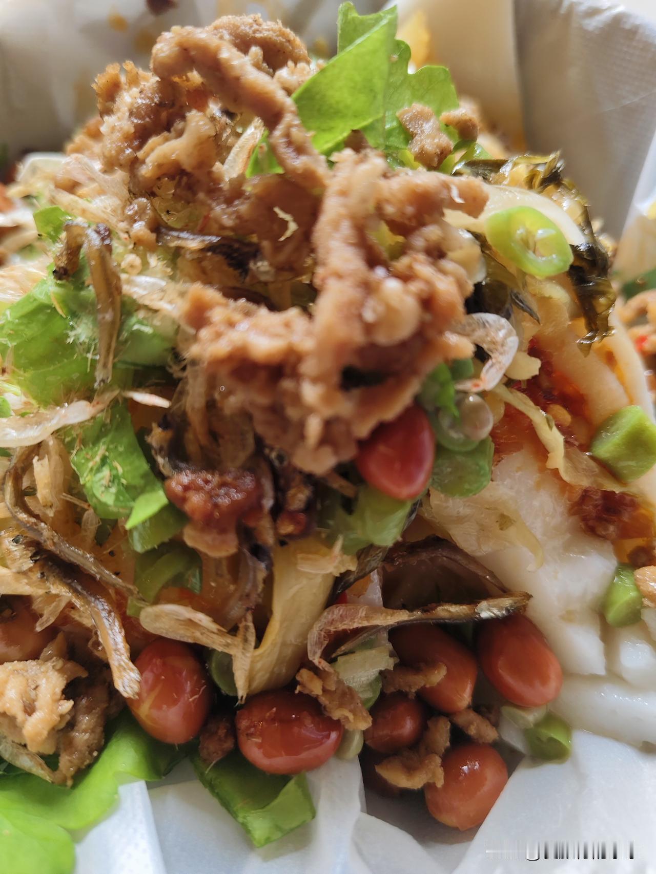 晒图笔记大赛儋州米烂，儋州猪肉卷，酸辣的，又香又爽口