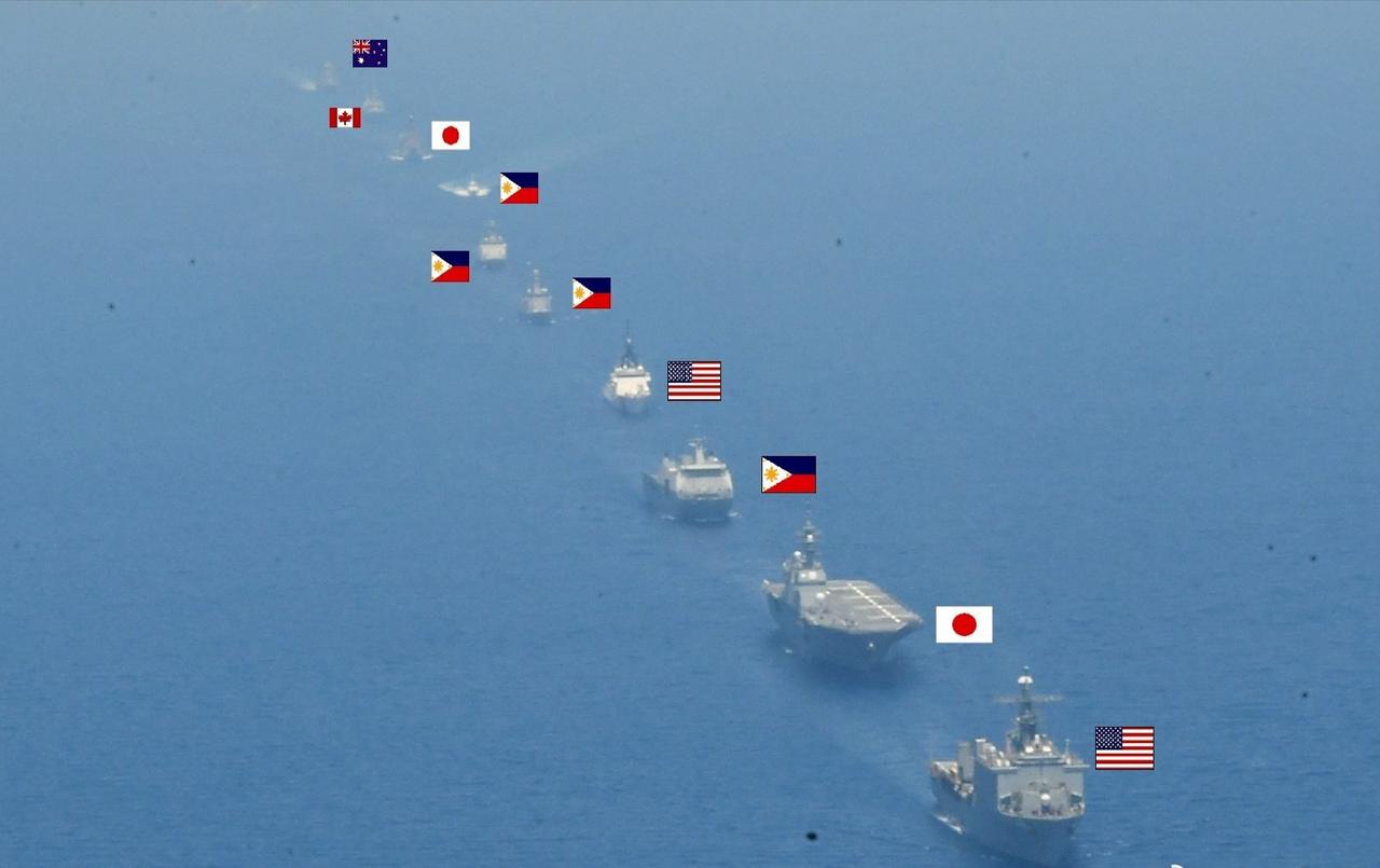 美国带着小弟们在南海搞战舰排排队的游戏，耀武扬威，虚张声势。这里面看着最不顺眼的