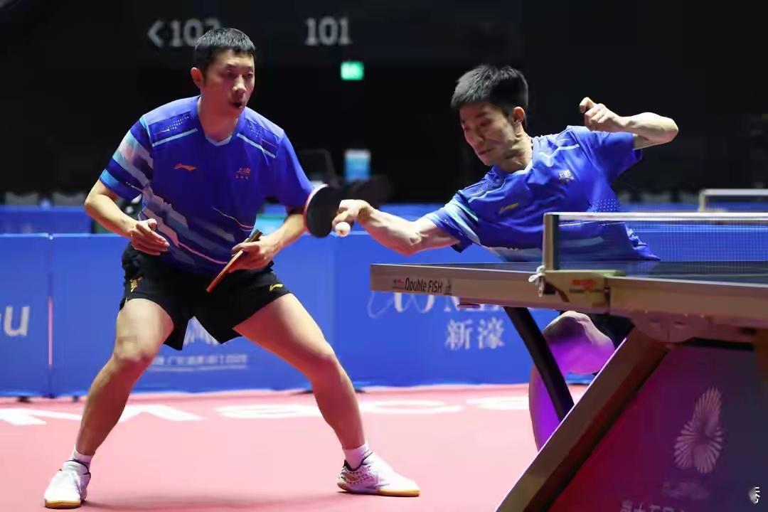 许昕/周恺3比2战胜马龙/黄友政（五局比分：5-11、11-6、7-11、11-