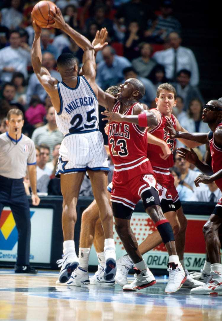 Michael Jordan 与幼年 Nick Anderson 