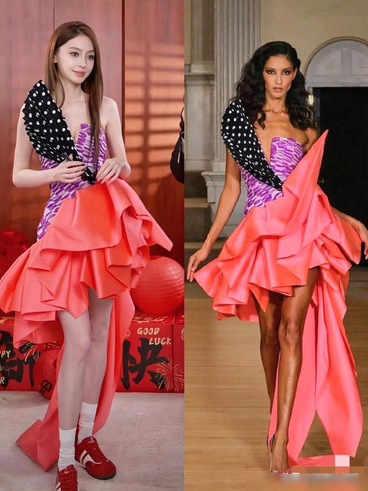 跌落神坛的杨颖，正在表演一种近乎讨好的顺从。

那身被冠以“高定”之名的礼服，像