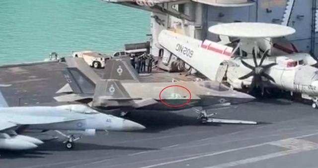 这仗还怎么打？F-35C的隐身涂层都磨成绿底漆了。
这事有意思就有意思在，照片是